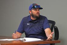 (THOMAS WALLNER | THE GRAHAM LEADER) Public Works Director Randall Dawson speaks to the Graham Planning and Zoning Commission in June during a public hearing held for a rezoning of an Indiana Street lot from Local Retail to Townhouse.