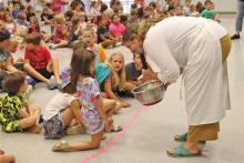 (ARCHIVE PHOTO | THE GRAHAM LEADER) Eleanor Burkett shares her culinary talents with an audience during the finale of the Library of Graham’s Summer Reading Program in 2024. Signups for the reading program will begin Friday, May 23.