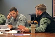 (FILE PHOTO | THE GRAHAM LEADER) Graham Assistant City Manager Grant Ingram (right) speaks with the Graham Economic Improvement Corporation Board of Directors during their meeting Wednesday, Nov. 1. The board discussed two programs which provide incentives for businesses.