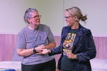 (THOMAS WALLNER | THE GRAHAM LEADER) Denise Cyr (left), playing Marilyn Dunne, and Summer Branum, playing Abby Binder, rehearse a scene of the upcoming Graham Regional Theater production ‘Ripcord,’ which will be playing next weekend at The Perry theater in Graham.