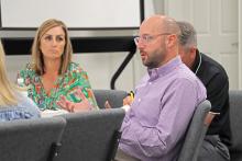 (THOMAS WALLNER | THE GRAHAM LEADER) Graham ISD Board of Trustees President Chris Blanton speaks with representatives from Impact Education Specialists which were hired by the district to search for a new superintendent. The representatives met with the school board in a special meeting held Thursday, Aug. 1.
