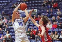 (THOMAS WALLNER | THE GRAHAM LEADER) Ty Thompson leans back to make a shot at the basket during the game Tuesday, Jan. 21 against Glen Rose. Thompson led in scoring for the team with 18 points, 16 of which were in the second half of the game.