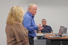 (THOMAS WALLNER | THE GRAHAM LEADER) Graham ISD Director of Curriculum and Instruction Gary Browning speaks with the GISD Board of Trustees during their meeting Wednesday, Sept. 11.