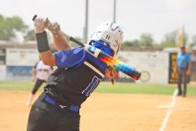 (ALEX HAVARDANSKY | THE GRAHAM LEADER) Jansyn Louder takes a swing at a pitch Friday, April 25 against the Snyder Lady Tigers. Louder consistently was placed at the top of the Lady Blues batting order and will look to stay a constant presence in the leadoff spot in the future.