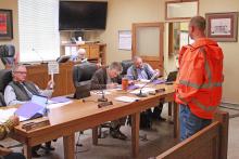 (TC GORDON | THE GRAHAM LEADER) Zach Husen, Graham Area Engineer Texas Department of Transportation, speaks with the Young County Commissioners Court regarding the County Road 237 bridge at the Clear Fork of the Brazos River. 