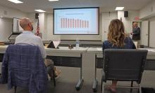 (THOMAS WALLNER | THE GRAHAM LEADER) Graham ISD Board President Chris Blanton (left) and board member Lauren Mahaney listen to a budget presentation Wednesday, Aug. 6 from Chief Financial Officer Gary Browning. A public hearing will be held Wednesday, Aug. 27 for the budget and tax rate.