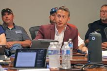 (THOMAS WALLNER | THE GRAHAM LEADER) Jacob & Martin Project Manager Tristan King speaks with the Graham City Council regarding the ongoing trails project during their meeting Thursday, Aug. 7. Two council members had concerns regarding the project which tabled the acceptance of a bid to complete the construction work.