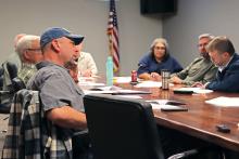 (THOMAS WALLNER | THE GRAHAM LEADER) Texas Department of Transportation Graham Area Engineer Zach Husen (front left) speaks with the Transportation Improvements Committee regarding a possible bypass connecting Hwy. 16 and Hwy. 67.