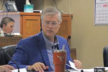 (ALEX HAVARDANSKY | THE GRAHAM LEADER) Young County Judge Win Graham at the commissioners court meeting Monday, Aug. 4. The commissioners are currently working to establish their budget for the upcoming fiscal year.