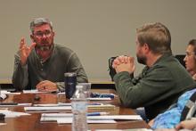 (THOMAS WALLNER | THE GRAHAM LEADER) Graham Parks Department Board of Directors Chairman Alex Heartfield (left) speaks with the board during a meeting held Tuesday, Dec. 12. The city was updated on multiple projects during the meeting.