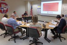 (THOMAS WALLNER | THE GRAHAM LEADER) The Graham ISD Board of Trustees hears a presentation from Chief Financial Officer Gary Browning during a public hearing and budget presentation held Wednesday, Aug. 27 at the GISD Administration Building.