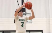 (ALEX HAVARDANSKY | THE GRAHAM LEADER) Keyton Newland shoots a three pointer Friday, Feb. 6 against the Garner Longhorns on senior night. Newland lit up the scoresheet from beyond the arc making five three pointers in the Bobcats 65-52 win. 