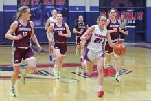 (THOMAS WALLNER | THE GRAHAM LEADER) Bentleigh Martin runs down the court to make a shot at the net during the Lady Blues game Friday, Jan. 31 against the Brownwood Lady Lions. The team put up a fight but ultimately fell 23-46 in the senior night game.