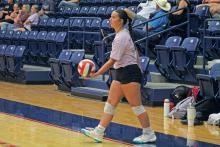 (ALEX HAVARDANSKY | THE GRAHAM LEADER) Newcastle’s Emma Hawkins prepares to serve during the Graham summer league Monday, June 24, 2024. Newcastle is holding one final volleyball camp before the regular season Monday and Tuesday, July 28-29.