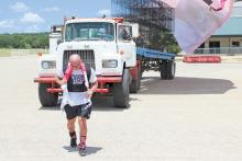 (ARCHIVE PHOTO | THE GRAHAM LEADER) Kris Rotonda, of the Jordan’s Way animal charity, pulls an 18-wheeler truck in 2024 around the Young County Arena parking lot over in an effort to raise money to get the Humane Society of Young County a new transport vehicle.