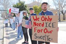 (THOMAS WALLNER | THE GRAHAM LEADER) An ‘Everything Protest’ was held Sunday, Feb. 3 on the sidewalk of Elm Street on the inside of the Graham downtown square. The protest was organized by Kaylee Clay who spread the word on social media to draw the community to the cause.
