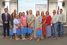 (THOMAS WALLNER | THE GRAHAM LEADER) The Graham ISD Board of Trustees recognized its teachers of the year during their meeting Wednesday, May 14. The teachers were Lisa Lester, Kalin Westerman, Kandice Craig, Jennifer Patrick and Paige Reese.