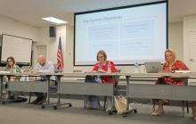 (THOMAS WALLNER | THE GRAHAM LEADER) Members of the Graham ISD Board of Trustees hear a presentation from the Texas Association of School Boards regarding a pay scale review of the district. Shown from left to right are Lauren Mahaney, Chris Blanton, Dr. Mary Johnston and Kristina Pettus. 