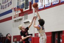 (ALEX HAVARDANSKY | THE GRAHAM LEADER) Bryce Martin puts up a one handed shot in one of the Steers’ previous matchups. The Martin brothers have been effective scorers for the Steers and will need to continue that going into the postseason. 