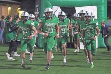 (ARCHIVE PHOTO | THE GRAHAM LEADER) The Newcastle Bobcats take the field before the start of their area playoff game Friday, Nov. 22 against Westbrook, which the Bobcats lost 98-52.