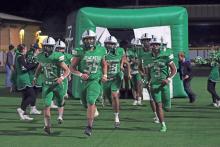 (ARCHIVE PHOTO | THE GRAHAM LEADER) The Newcastle Bobcats run out onto the field for their area playoff matchup Friday, Nov. 22, against Westbrook. The Bobcats ultimately lost the contest 98-52.