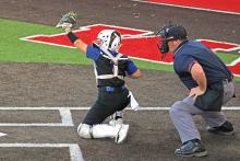 (ALEX HAVARDANSKY | THE GRAHAM LEADER) Kylie Pruitt behind the dish at catcher for the Lady Blues in their Tuesday, April 1 matchup against the Lady Rams. Pruitt was very versatile in their victory calling a great game behind home plate while also delivering the games biggest hit. 