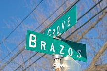 (THOMAS WALLNER | THE GRAHAM LEADER) The Brazos Street and Grove Street intersection in Graham. One of the repaving projects scheduled for 2024 from the city of Graham is Brazos Street from Grove Street to Pecan Street which will be completed with a micro surface slurry seal.