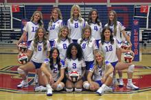 (ALEX HAVARDANKSY | THE GRAHAM LEADER) The Lady Blues volleyball team pose for a team photo prior to the start of the 2025 season. All members of the Lady Blues volleyball team were named as academic all-district athletes and students. 