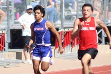 (ALEX HAVARDANSKY | THE GRAHAM LEADER) Santiago Zamora races to the finish line in the 4x100 meter relay at the Ram Relays. The Steers finished sixth in the event in their season opener Friday, Feb. 27. 