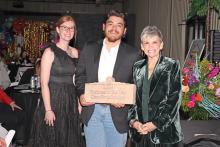 (ARCHIVE PHOTO | THE GRAHAM LEADER) Clear Fork Country was presented the Business of the Year award during the 2024 Grahammy awards from the Chamber of Commerce. Shown from left to right are Graham Chamber Director Cayley Strickland, Husky Melendez and Chamber CEO Cathy Partridge.