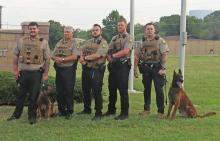 (THOMAS WALLNER | THE GRAHAM LEADER) Young County Sheriff’s Office deputies pose for a photo Wednesday, June 21. At the far right of the photo are K9 Handler Alex Maiden with K9 Deputy Sam. Sam passed away later the same day due to medical complications.