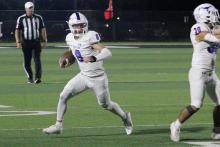 (ALEX HAVARDANSKY | THE GRAHAM LEADER) Jace Gill cuts to the sideline on a rushing attempt Thursday, Oct. 23, against the Mineral Wells Rams. Gill has been the offensive leader for the Steers all season.