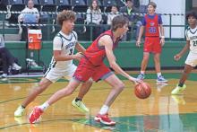 (TC GORDON | THE GRAHAM LEADER) Graham post player Nikolas Wankowicz begins his dribble at the free throw line as he looks to drive to the basket for a layup during a game earlier this season.