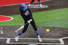 (ALEX HAVARDANSKY | THE GRAHAM LEADER) Tiffany Cotter swings at a ball in one of the Lady Blues previous matchups. Cotter was on the mound against the Graford Lady Rabbits and helped the team come away with an 11-5 victory Monday, March 9. 