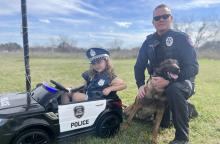 (DAVID LIPSEY | CONTRIBUTED PHOTO) Graham Police Department Officer David Lipsey and his daughter pose with K-9 Ragnar. Ragnar recently became a permanent resident of the Lipsey household after being retired from the department at the end of June.