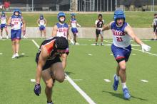(ALEX HAVARDANSKY | THE GRAHAM LEADER) Thomason Burkett defends a pass Saturday, May 17 against the Springtown Porcupines. Burkett made the most of his first chance to shine on both ends of the field during the opener of this offseason program.