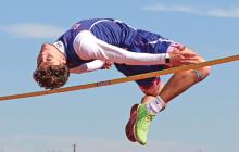 (KYLIE BAILEY | THE GRAHAM LEADER) Jordan Alexander of the varsity Steers team makes a jump in the high jump portion of the Mineral Wells Ram Relays event held Saturday, Feb. 22. 