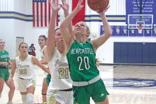 (BRIAN SMITH | JACKSBORO HERALD-GAZETTE) Catherine Youngblood beats a Perrin defender to the basket during Newcastle’s game with Perrin. Youngblood tossed in 12 points to help the Ladycats take a 55-33 win and remain perfect in district. 