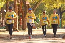(ARCHIVE PHOTO | THE GRAHAM LEADER) A group of runners decked out in 10th anniversary Spivey Hill Challenge shirts approach the finish line at Firemen’s Park during the 2024 race. The race this year will take place Saturday, Nov. 8 benefiting two area nonprofit organizations.