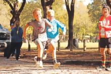 (THOMAS WALLNER | THE GRAHAM LEADER) Spivey Hill Challenge 5K runners approach the finish line at Firemen’s Park in November 2024. The Firemen’s Park trails project will be moving forward after getting approval from the Texas Parks and Wildlife Department.