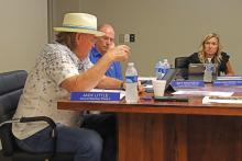 (THOMAS WALLNER | THE GRAHAM LEADER) Graham City Council member Jack Little speaks with the council during its meeting Thursday, July 20. The council approved the first reading of the proposed budget and tax rate for the city.