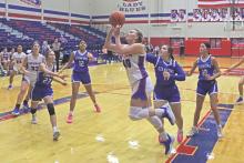 (ARCHIVE PHOTO | THE GRAHAM LEADER) Graham’s Addyson Weaver puts up a close shot at the beginning of a game earlier in the season. Weaver hauled in a team-high seven rebounds during the Portales game in the Lubbock Cooper Liberty Tournament held last week.