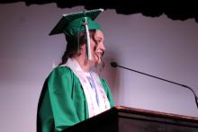 (ALEX HAVARDANSKY | THE GRAHAM LEADER) Class Valedictorian Ashleigh Taylor gives her graduation speech Friday, May 23. Taylor emphasized how you can still do big things even at a small school which she will prove by attending Harvard University in the fall. 