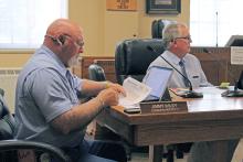 (TC GORDON | THE GRAHAM LEADER) Young County Commissioners Jimmy Wiley (left) and Stacey Rogers (right) listen to a presentation during the commissioners court meeting Monday, Aug. 19. The county will hold public hearings and potentially vote on the fiscal year 2025 budget and tax rate at 9:30 a.m. Monday, Aug. 26.
