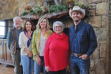 (THOMAS WALLNER | THE GRAHAM LEADER) New owners of the Wildcatter Ranch & Resort George and Kalli Doubleday and Kevin and Linda Fullerton pose with former owner Anne Skipper. Shown from left to right are Kevin and Linda Fullerton, Kalli Doubleday, Skipper and George Doubelday.