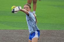 (ARCHIVE PHOTO | THE GRAHAM LEADER) One of the Lady Blues incoming 6th through 9th graders practiced her throwing mechanics Tuesday, May 27. Coach Adam Arrington held two practice sessions, one for incoming 2nd through 5th graders earlier in the morning and one for incoming 6th through 9th graders going into the afternoon.