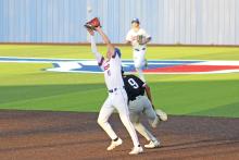(ALEX HAVARDANSKY | THE GRAHAM LEADER) Tanner Hurford catches an infield pop up for an out Tuesday, April 8. Hurford is the starting second baseman for the Steers.