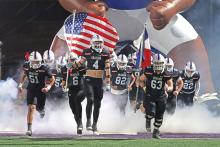 (ARCHIVE PHOTO | THE GRAHAM LEADER) The Graham Steers take the field before the start of their region final game against the Brock Eagles. The two teams battled, but Graham’s season ended in a triple overtime 12-10 loss Dec. 6, 2024.