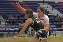 (ALEX HAVARDANSKY | THE GRAHAM LEADER) Landree Smith plays man-to-man defense on a Haskell offensive player Tuesday, Nov, 11. The Lady Blues were great at generating points off of defensive opportunities. 