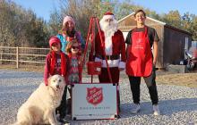 (THOMAS WALLNER | THE GRAHAM LEADER) The Salvation Army Graham Unit Kettle Coordinator Tracey Terasas poses with her family who will be helping her with the annual fundraising campaign this year that begins Thursday, Nov. 20. Shown are Tracey Terasas, Tony Terasas, Nathaniel Frias, Jeahlynne Frias and Paislee Lee. 